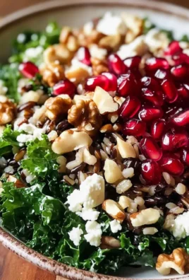 Pomegranate, Kale, and Wild Rice Salad with Walnuts and Feta